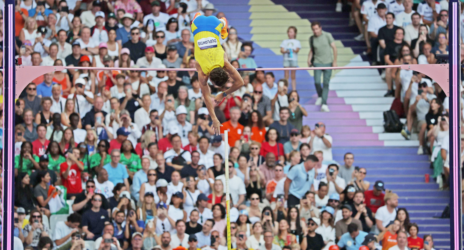 Armand Duplantis pole vaulting at the Paris Olympics.