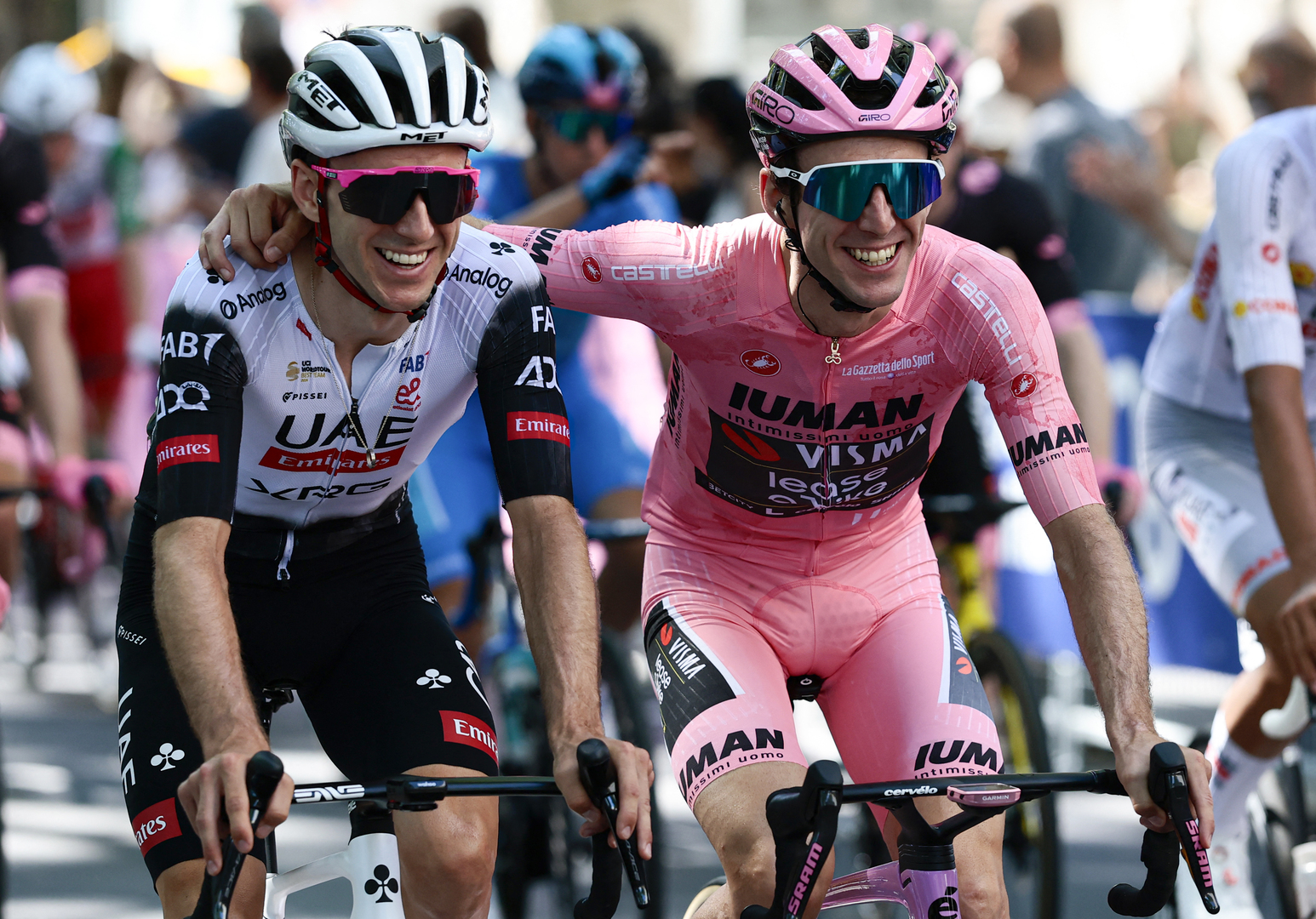 Adam Yates and Simon Yates, cycling brothers, riding together in the Giro d'Italia.