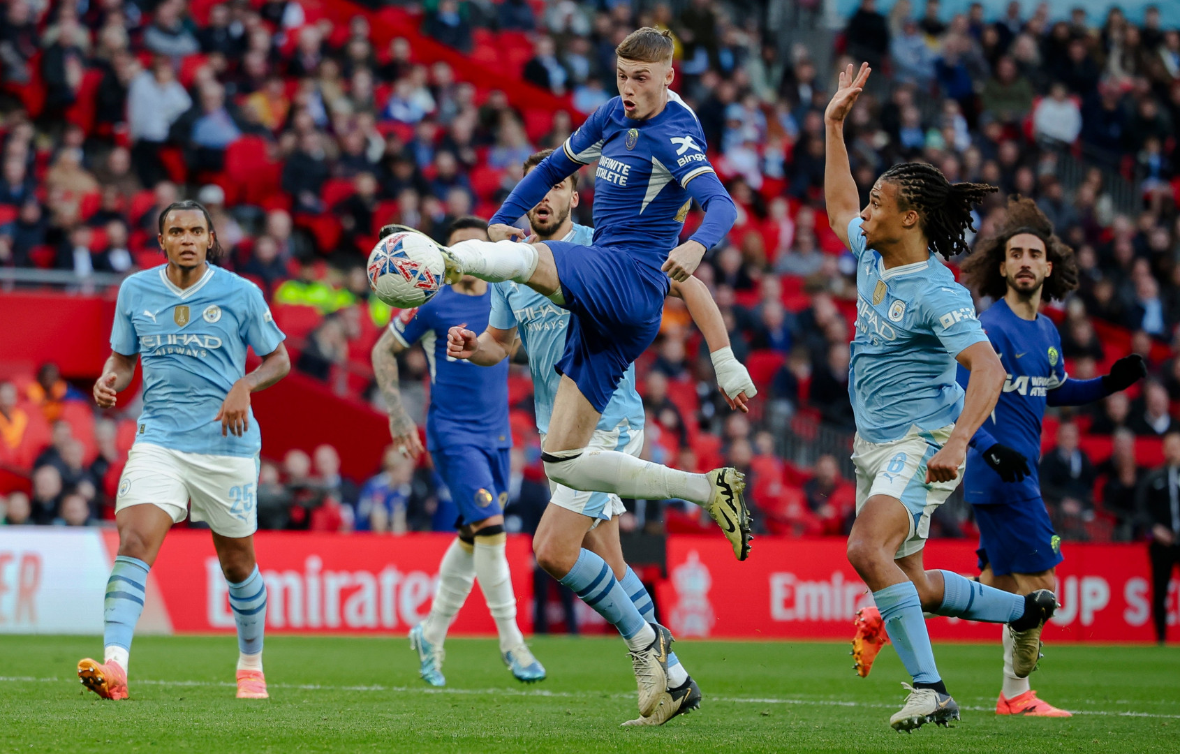 Cole Palmer of Chelsea shoots during an FA Cup semi-final match against Manchester City at Wembley Stadium.