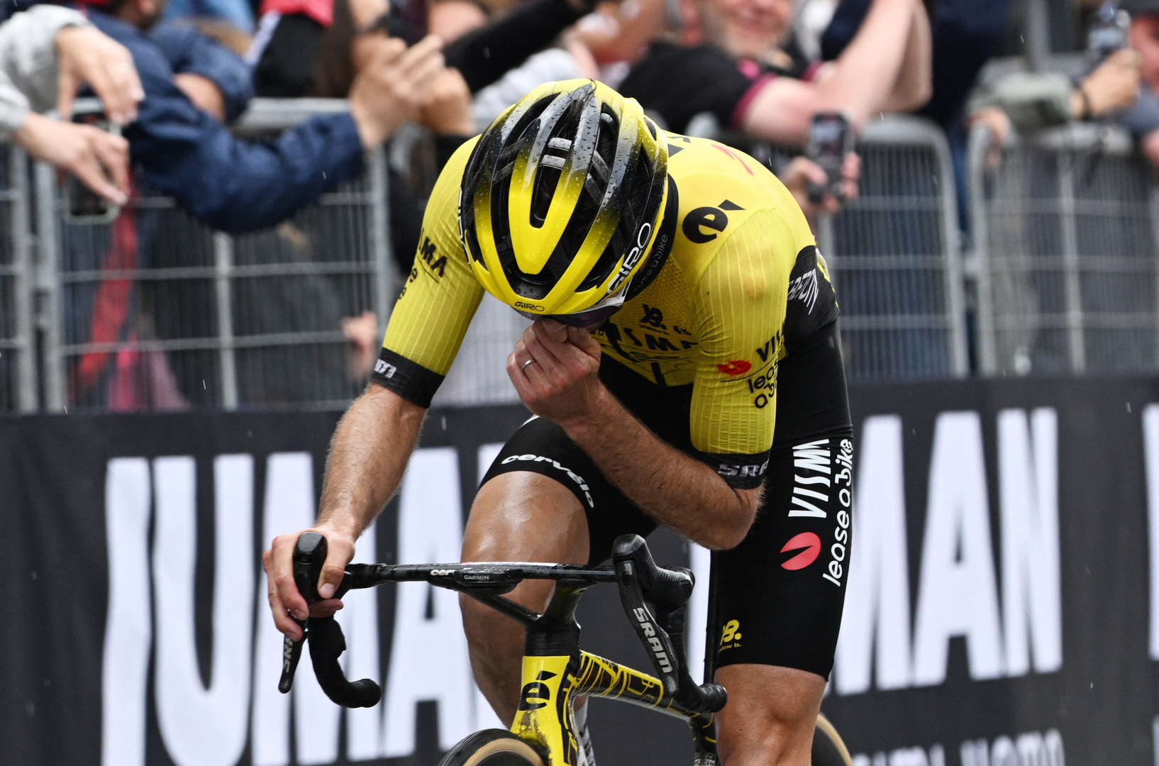 Simon Yates of Team Visma | Lease a Bike reacting after finishing a cycling race.